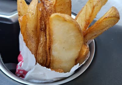 A bag of thick-cut potato wedges
