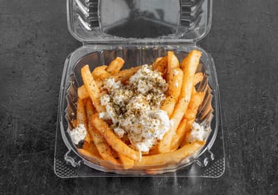 Greek fries topped with crumbled feta and oregano