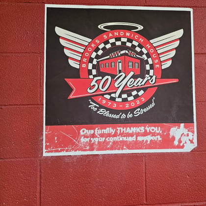 A poster celebrating 50 years of Brooks' Sandwich House