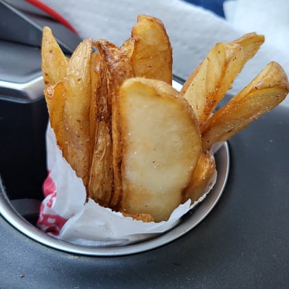A bag of thick-cut potato wedges