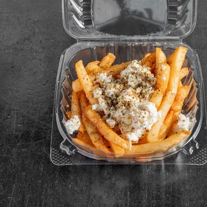 Greek fries topped with crumbled feta and oregano