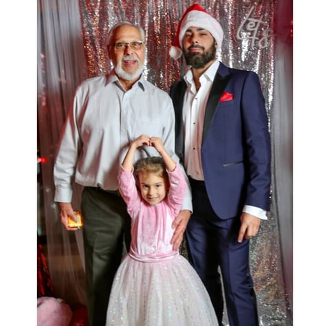Jayme, Grandpa and Isla, 2021 B.U.I.L.D. Group Christmas party
