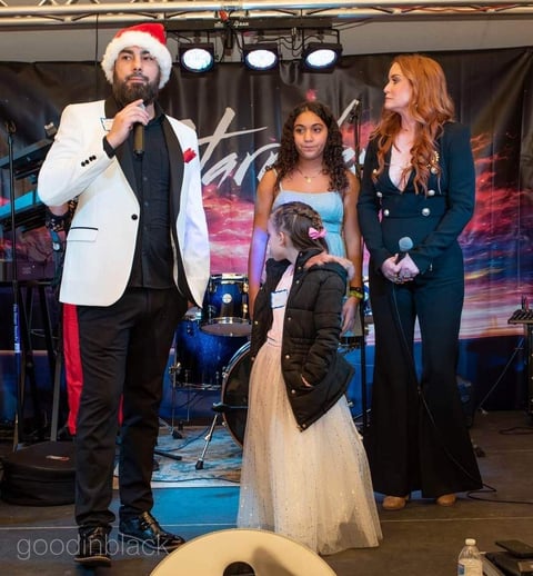 Jayme, Meredith, Isla and a guest speaker, 2022 B.U.I.L.D. Group Holiday Gala